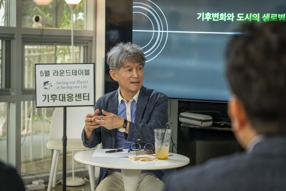 Speaker at a roundtable